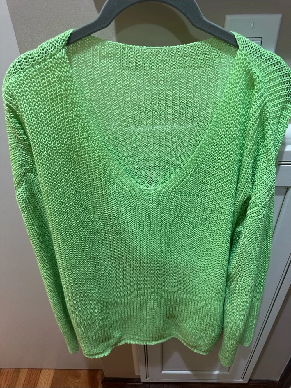 Vibrant Green Knit V-Neck Sweater with an 80’s Vibe